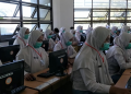 idsch.id - Sekolah Terapkan Protokol Penanganan COVID-19, Hari Pertama UNBK SMK/MAK Berjalan Lancar